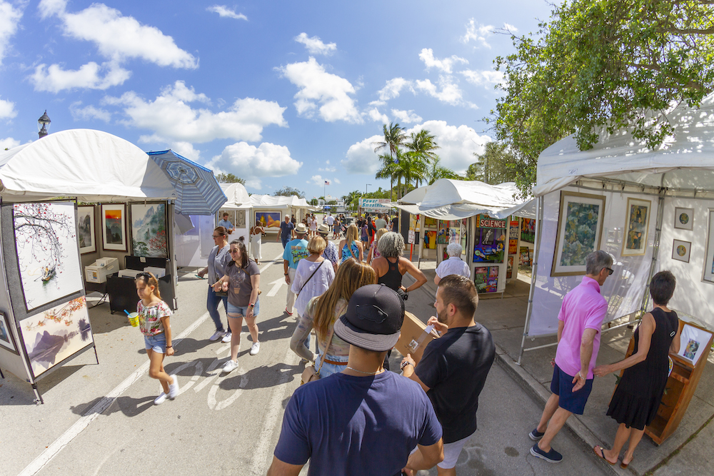 people at street craft fair